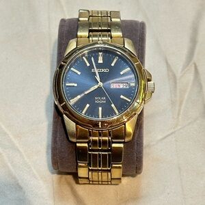 Seiko Mens Solar Black Dial Gold Tone Steel Watch Sne100